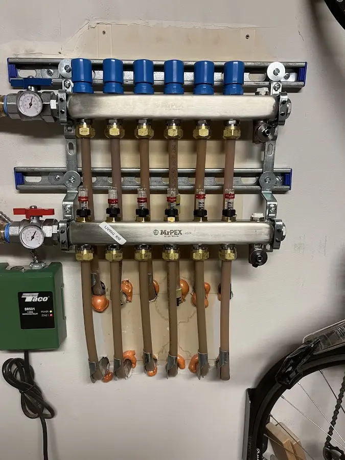 Plumber performing Water Heater Repair at a residential property in Rifle